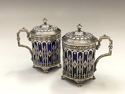 Lot 14 - A pair of French silver pierced and embossed...