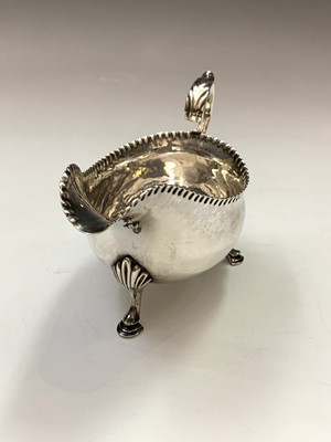 Lot 74 - A George III silver sauce boat by William...