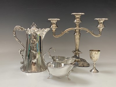Lot 176 - An Art Nouveau EPBM jug a silver egg cup a...
