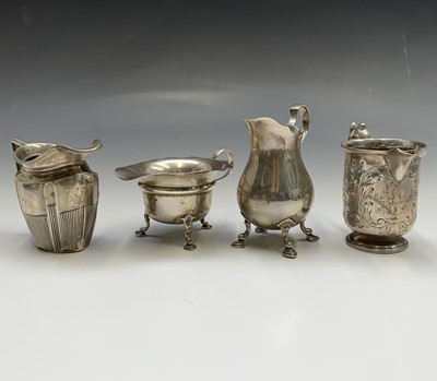 Lot 118 - A Georgian style bellied cream jug and three...