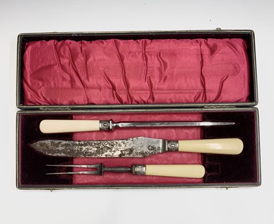 Lot 167 - A carving set