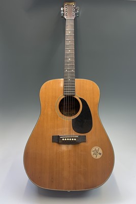 Lot 157 - A 1970s Yamaki Deluxe Folk acoustic guitar.