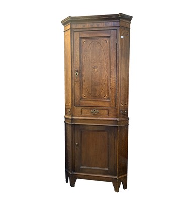 Lot 54 - A George III inlaid oak corner cupboard, the...