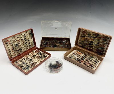 Lot 17 - Two boxes of assorted fishing flies and a...