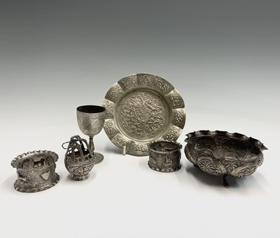 Lot 1049 - An Indian silver lobed bowl, raised on three...