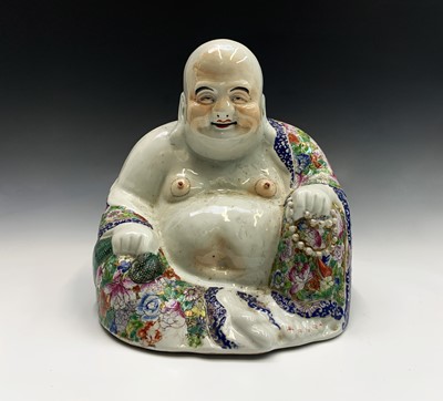 Lot 52 - A large Chinese porcelain figure of a seated...