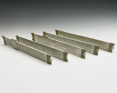 Lot 143 - Five Thornton slide rules. Length 36cm.