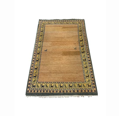 Lot 1213 - A Gabbeh carpet, the palin abrash field within...