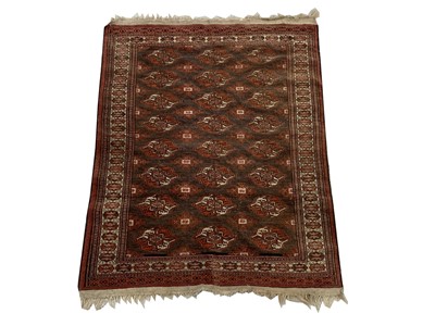 Lot 1214 - A Bokhara rug, early 20th century, the brown...