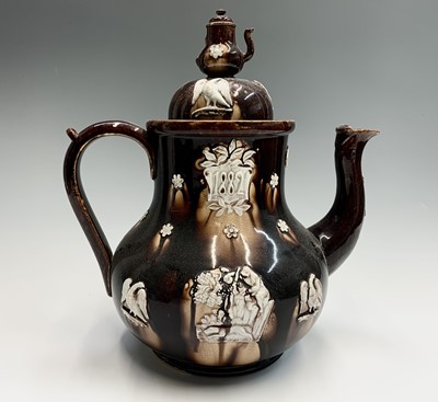 Lot 826 - A Victorian Measham treacle glazed bargeware...