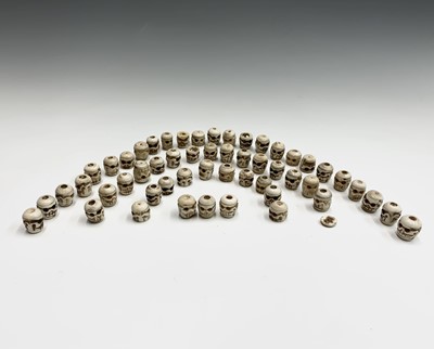 Lot 72 - Fifty-three Tibetan bone skull beads,.largest...