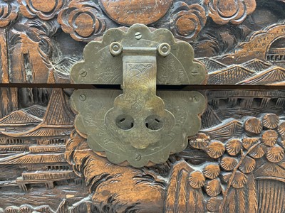Lot 64 - A Chinese carved camphor wood chest, 20th...