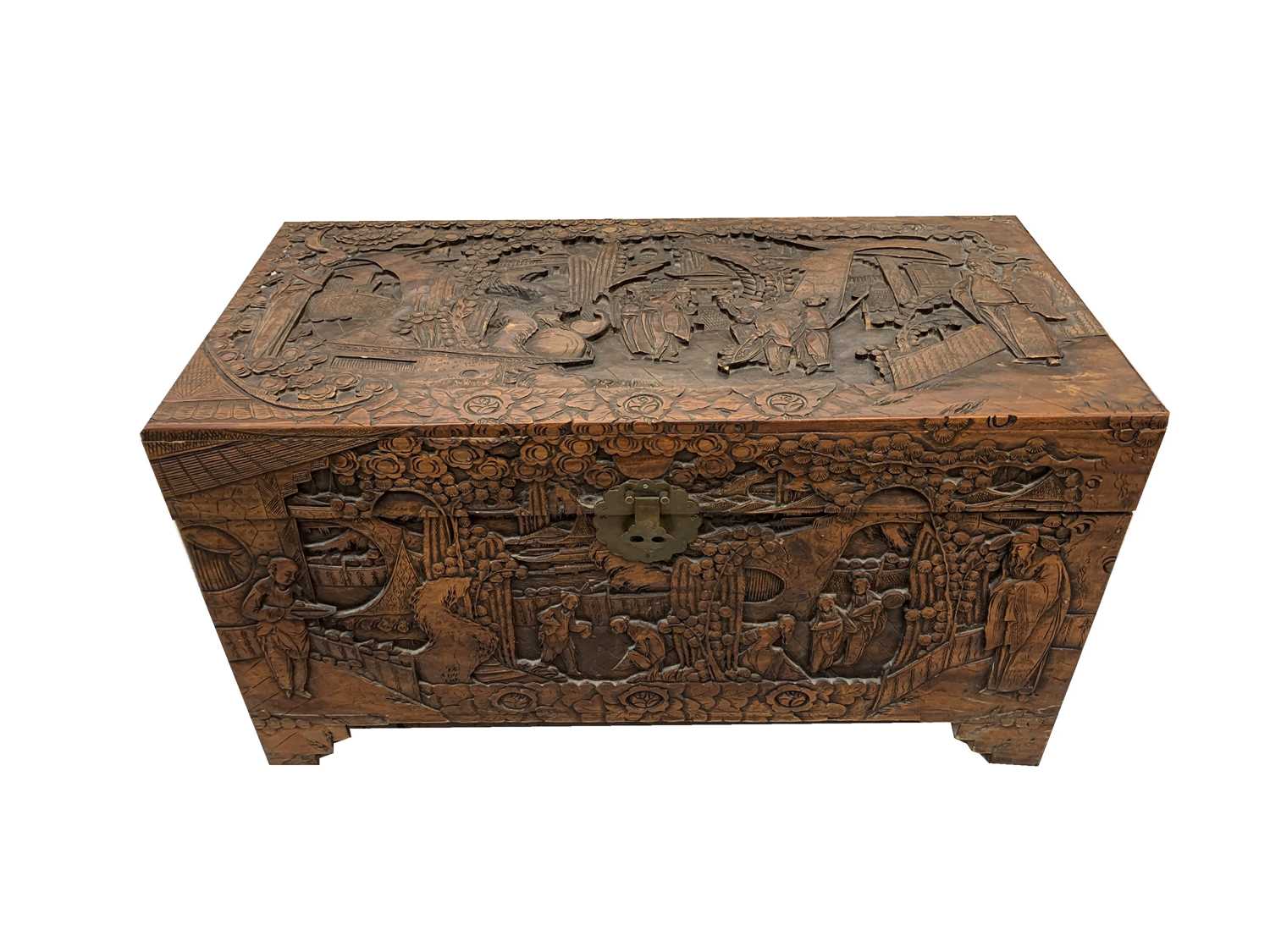 Lot 64 - A Chinese carved camphor wood chest, 20th...
