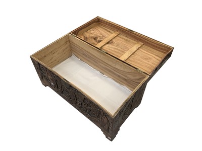 Lot 64 - A Chinese carved camphor wood chest, 20th...