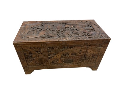 Lot 64 - A Chinese carved camphor wood chest, 20th...