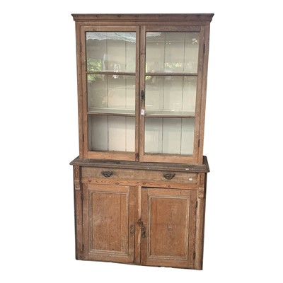 Lot 3313 - A late Victorian pine bookcase, with a pair of...