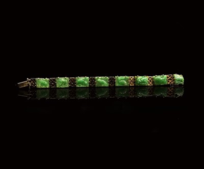 Lot 26 - A Chinese jade and 9ct gold linked bracelet,...