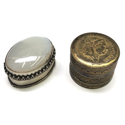 Lot 21 - A 19th century circular gilt brass box, the...