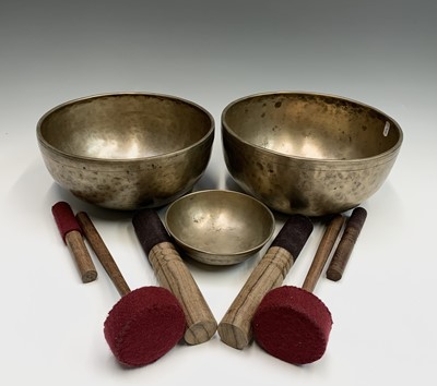 Lot 172 - Two large Tibetan/Himalayan hand beaten...