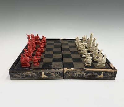 Lot 83 - A Chinese Canton carved ivory chess set, 19th...