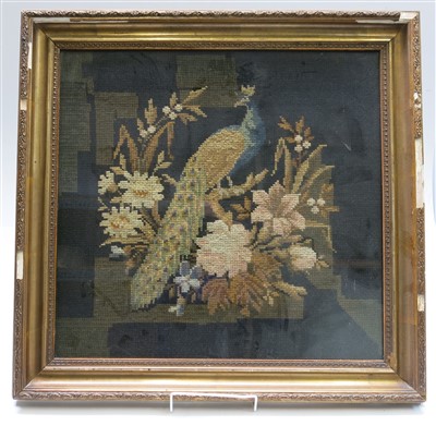 Lot 3213 - A Victorian woolwork picture of a peacock...