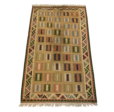 Lot 1220 - A Turkish Kelim, the yellow field with ten...