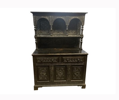 Lot 114 - A Victorian carved oak buffet, the upper part...