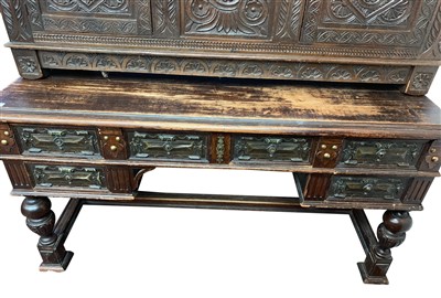 Lot 3400 - A carved oak desk, early 20th century, with an...