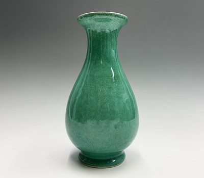 Lot 71 - A Chinese green crackle glazed earthenware...