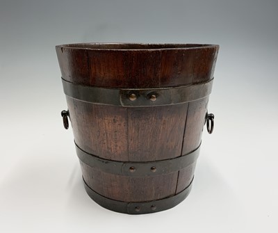 Lot 2 - An Edwardian teak jardiniere, of copper banded...