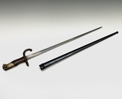 Lot 97 - A French Gras bayonet, with two piece wood...