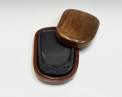 Lot 229 - A Chinese carved black slate inkstone, 15 x...
