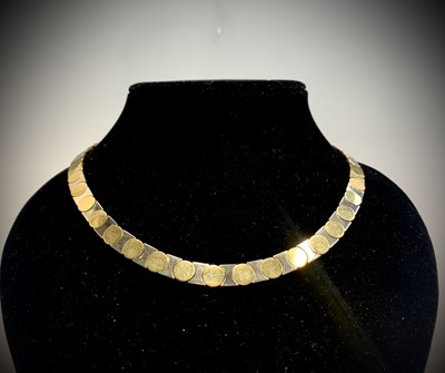 Lot 7 - A stylish contemporary Italian 18ct two-colour...