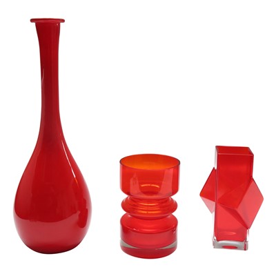 Lot 1004 - Three mid century red glass vases, the tallest...