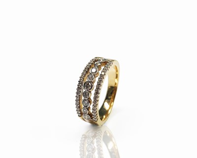 Lot 37 - A 14ct gold three row diamond ring 6.3gm