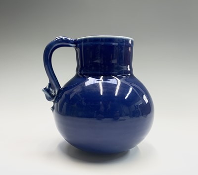 Lot 65 - A Chinese powder-blue monochrome water pot,...