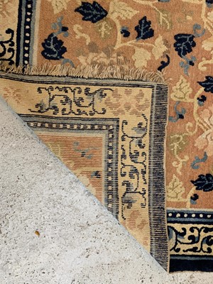 Lot 1228 - A Chinese carpet, 19th century, the camel...
