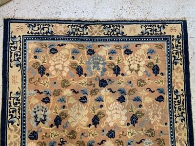 Lot 1228 - A Chinese carpet, 19th century, the camel...