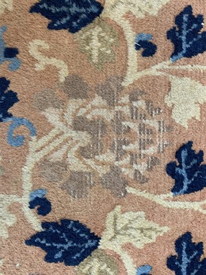 Lot 1228 - A Chinese carpet, 19th century, the camel...