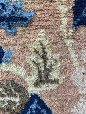 Lot 1228 - A Chinese carpet, 19th century, the camel...