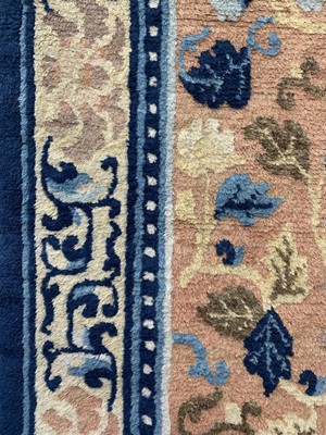 Lot 1228 - A Chinese carpet, 19th century, the camel...