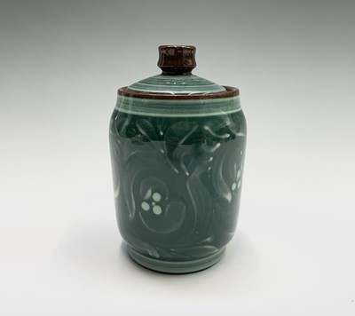 Lot 1072 - A Lamorna Pottery green glazed lidded pot,...