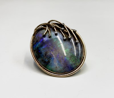 Lot 74 - A contemporary oval opal brooch, set in 9ct...