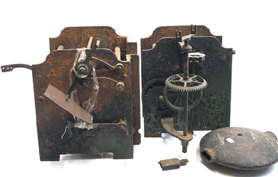 Lot 3034 - A 19th century iron turret clock, in two parts...