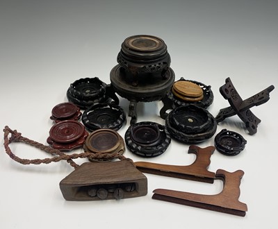 Lot 273 - A Chinese hardwood stand, 20th century, on...