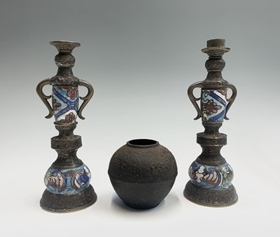 Lot 276 - A Japanese cast iron spherical pot, with wave...