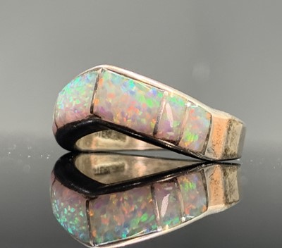 Lot 199 - Three opal set silver rings 19.2gm