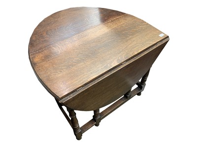 Lot 3013 - An early 20th century oak gate leg dining...