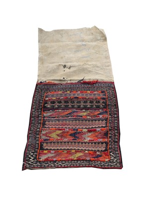 Lot 1237 - A Persian flatweave saddle bag, 19th century,...