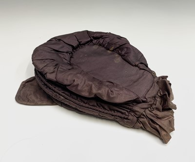 Lot 2812 - A late 18th century brown silk Calash bonnet,...